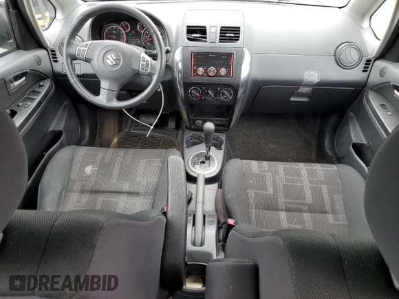 ✅ 2012 Suzuki SX4 LE • VIN: JS2YC5A3XC6304007 • Lot: 80989485. Listed on Copart with 178,892 mi. Free auction sales archive from the USA and detailed vehicle history report at DreamBid. Image 8.