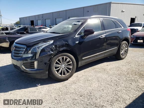 ✅ 2018 Cadillac XT5 Luxury FWD • VIN: 1GYKNCRS9JZ126414 • Лот: 92214165. Опубликован ранее на Copart с пробегом 67 176 миль. Бесплатный доступ к архиву аукционных продаж из США и подробный отчёт об истории автомобиля на DreamBid. Изображение 1.