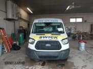 ✅ 2016 Ford Transit Cargo • VIN: 1FTYR2CM3GKA99298 • Lot: 42983180. Listed on IAAI with 127,890 mi. Free auction sales archive from the USA and detailed vehicle history report at DreamBid. Image 13.