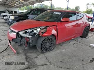 2013 Hyundai Veloster w/Black Int с VIN KMHTC6AD1DU108579, выставлен на аукционе Copart как лот 69996895 с пробегом 187 355 миль миль и Списание • Salvage title. История ставок и продаж доступна на DreamBid. Изображение 1.
