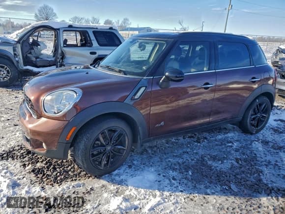 ✅ 2014 MINI Countryman S • VIN: WMWZC5C59EWP39467 • Lot: 94575355. Listed on Copart with 127,263 mi. Free auction sales archive from the USA and detailed vehicle history report at DreamBid. Image 1.
