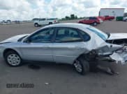 ✅ 2001 Ford Taurus LX • VIN: 1FAFP52U11G202752 • Лот: 43032357. Опубликован ранее на IAAI с пробегом 140 729 миль. Бесплатный доступ к архиву аукционных продаж из США и подробный отчёт об истории автомобиля на DreamBid. Изображение 14.