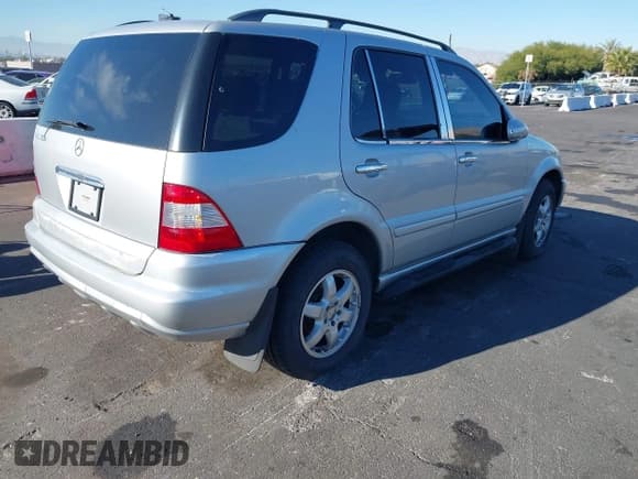 ✅ 2003 Mercedes-Benz M 350 • VIN: 4JGAB57E23A439529 • Lot: 43908675. Listed on IAAI with 222,188 mi. Free auction sales archive from the USA and detailed vehicle history report at DreamBid. Image 4.