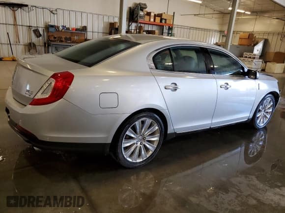 ✅ 2013 Lincoln MKS EcoBoost • VIN: 1LNHL9FT4DG618527 • Lot: 70274905. Wystawiony na Copart z przebiegiem 77 252 mil. Bezpłatny archiwum sprzedaży aukcyjnych z USA i szczegółowy raport historii pojazdu na DreamBid. Zdjęcie 3.