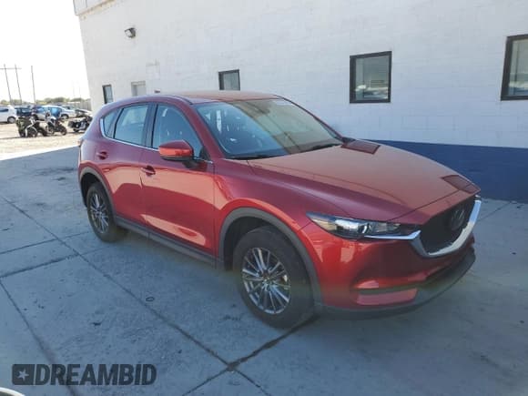 ✅ 2021 Mazda CX-5 Sport • VIN: JM3KFBBM4M0308076 • Lot: 82270425. Listed on Copart with 19,637 mi. Free auction sales archive from the USA and detailed vehicle history report at DreamBid. Image 4.