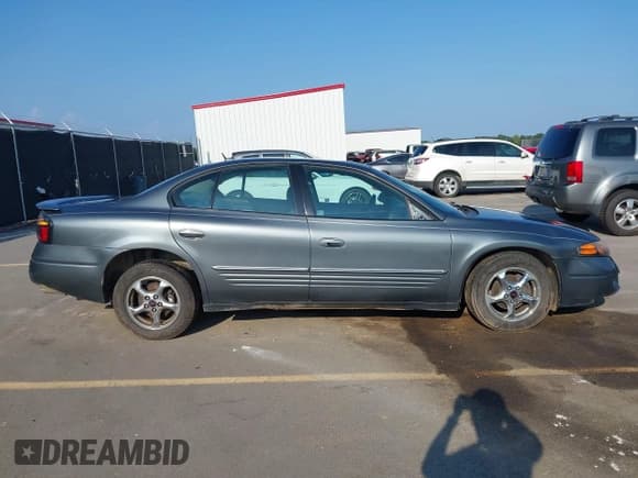 ✅ 2005 Pontiac Bonneville SE • VIN: 1G2HX52K95U187303 • Lot: 42985606. Wystawiony na IAAI z przebiegiem 170 700 mil. Bezpłatny archiwum sprzedaży aukcyjnych z USA i szczegółowy raport historii pojazdu na DreamBid. Zdjęcie 14.
