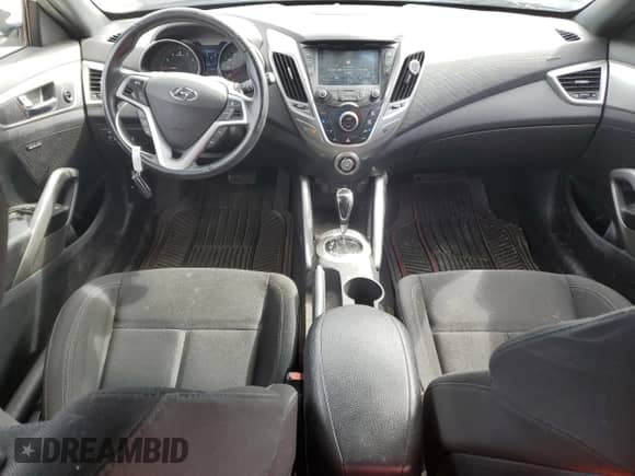 2017 Hyundai Veloster z VIN KMHTC6AD9HU316618, wystawiony jako Copart lot #70060254 z przebiegiem 76 823 mil mil oraz Czysty tytuł • Clean title. Historia ofert i sprzedaży dostępna na DreamBid. Obrazek 8.