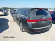 ✅ 2014 Honda Odyssey Touring • VIN: 5FNRL5H99EB051715 • Lot: 43405838. Listed on IAAI with 176,921 mi. Free auction sales archive from the USA and detailed vehicle history report at DreamBid. Image 3.