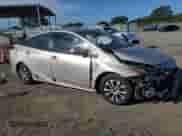 2021 Toyota Prius LE z VIN JTDKAMFP6M3174337, wystawiony jako Copart lot #81413265 z przebiegiem 142 475 mil mil oraz Szkoda całkowita • Salvage title. Historia ofert i sprzedaży dostępna na DreamBid. Obrazek 4.