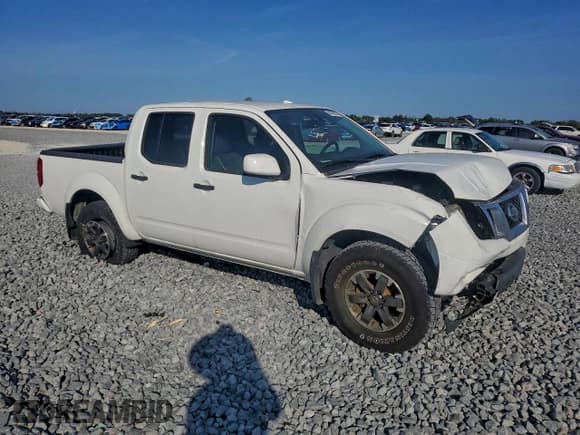 ✅ 2018 Nissan Frontier Pro-4X • VIN: 1N6AD0EV5JN768460 • Lot: 94796935. Listed on Copart with 82,142 mi. Free auction sales archive from the USA and detailed vehicle history report at DreamBid. Image 4.