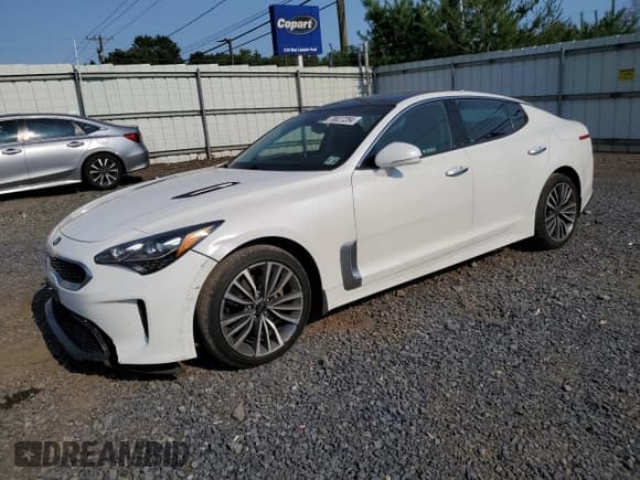 ✅ 2019 Kia Stinger • VIN: KNAE15LA6K6044988 • Лот: 70027284. Опубликован ранее на Copart с пробегом 74 126 миль. Бесплатный доступ к архиву аукционных продаж из США и подробный отчёт об истории автомобиля на DreamBid. Изображение 1.