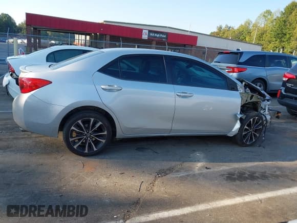 ✅ 2018 Toyota Corolla LE • VIN: 5YFBURHE6JP827476 • Lot: 43265766. Listed on IAAI with 135,859 mi. Free auction sales archive from the USA and detailed vehicle history report at DreamBid. Image 14.