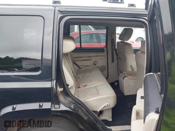 ✅ 2006 Jeep Commander Limited • VIN: 1J8HH58N96C280493 • Lot: 42589014. Wystawiony na IAAI z przebiegiem 234 739 mil. Bezpłatny archiwum sprzedaży aukcyjnych z USA i szczegółowy raport historii pojazdu na DreamBid. Zdjęcie 8.