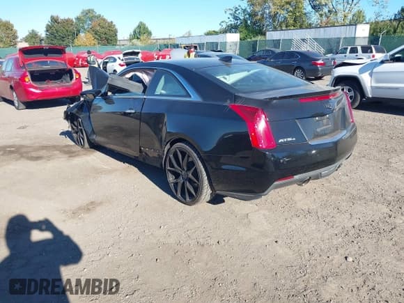 ✅ 2015 Cadillac ATS Performance AWD • VIN: 1G6AJ1R33F0110072 • Lot: 43450131. Listed on IAAI with Not provided. Free auction sales archive from the USA and detailed vehicle history report at DreamBid. Image 3.