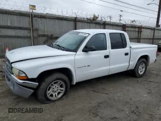 ✅ 2002 Dodge Dakota SLT • VIN: 1B7HL48NX2S638927 • Lot: 49182285. Wystawiony na Copart z przebiegiem 376 546 mil. Bezpłatny archiwum sprzedaży aukcyjnych z USA i szczegółowy raport historii pojazdu na DreamBid. Zdjęcie 1.