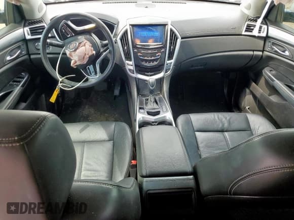 ✅ 2016 Cadillac SRX • VIN: 3GYFNAE31GS575354 • Lot: 64786435. Wystawiony na Copart z przebiegiem 176 079 mil. Bezpłatny archiwum sprzedaży aukcyjnych z USA i szczegółowy raport historii pojazdu na DreamBid. Zdjęcie 8.