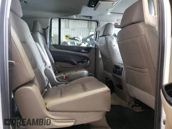 2020 Chevrolet Suburban Premier z VIN 1GNSKJKC5LR174248, wystawiony jako Copart lot #73365664 z przebiegiem 124 755 mil mil oraz Szkoda całkowita • Salvage title. Historia ofert i sprzedaży dostępna na DreamBid. Obrazek 11.