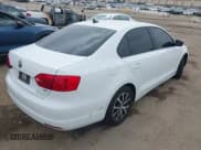 ✅ 2014 Volkswagen Jetta TDI w/Premium/Nav • VIN: 3VWLL7AJ4EM301098 • Lot: 42444151. Listed on IAAI with 180,750 mi. Free auction sales archive from the USA and detailed vehicle history report at DreamBid. Image 4.