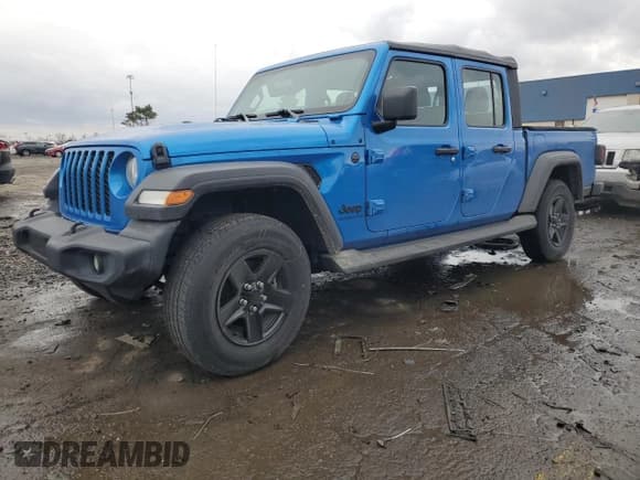 ✅ 2022 Jeep Gladiator Sport • VIN: 1C6HJTAG7NL100980 • Лот: 90792205. Опубликован ранее на Copart с пробегом 27 819 миль. Бесплатный доступ к архиву аукционных продаж из США и подробный отчёт об истории автомобиля на DreamBid. Изображение 1.