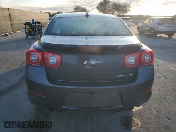 ✅ 2013 Chevrolet Malibu LTZ • VIN: 1G11H5SA3DF296143 • Lot: 89689635. Wystawiony na Copart z przebiegiem 210 712 mil. Bezpłatny archiwum sprzedaży aukcyjnych z USA i szczegółowy raport historii pojazdu na DreamBid. Zdjęcie 6.