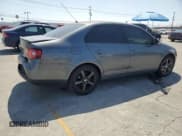 ✅ 2009 Volkswagen Jetta S • VIN: 3VWJZ71K39M128033 • Lot: 61787605. Wystawiony na Copart z przebiegiem 180 000 mil. Bezpłatny archiwum sprzedaży aukcyjnych z USA i szczegółowy raport historii pojazdu na DreamBid. Zdjęcie 3.