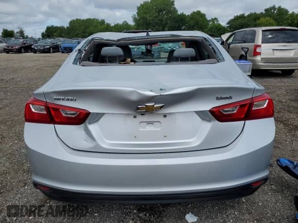 2018 Chevrolet Malibu LS with VIN 1G1ZB5ST0JF131958, listed as a Copart auction lot 64519365 with 93,785 mi miles and Salvage title. Bid and sale history available at DreamBid. Image 6.