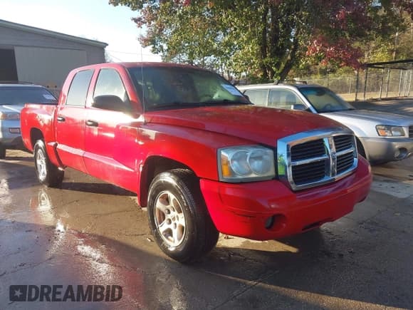 ✅ 2006 Dodge Dakota SLT • VIN: 1D7HE48N66S501330 • Lot: 43688359. Listed on IAAI with 199,726 mi. Free auction sales archive from the USA and detailed vehicle history report at DreamBid. Image 1.