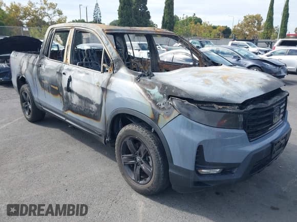 ✅ 2023 Honda Ridgeline Black Edition • VIN: 5FPYK3F88PB051812 • Lot: 43245405. Listed on IAAI with 11 mi. Free auction sales archive from the USA and detailed vehicle history report at DreamBid. Image 1.