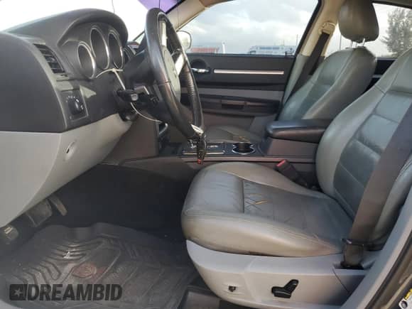 2008 Dodge Charger SXT с VIN 2B3KA33G18H144715, выставлен на аукционе Copart как лот 77578504 с пробегом 158 834 миль миль и Списание • Salvage title. История ставок и продаж доступна на DreamBid. Изображение 7.