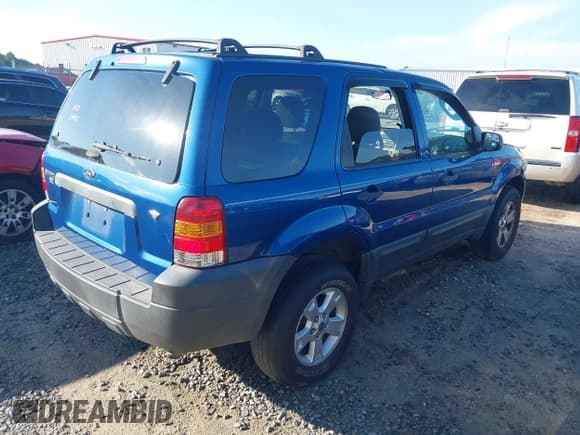 ✅ 2007 Ford Escape XLT • VIN: 1FMYU93197KA06129 • Lot: 42844897. Listed on IAAI with 138,951 mi. Free auction sales archive from the USA and detailed vehicle history report at DreamBid. Image 4.