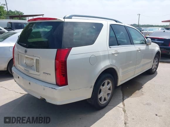 ✅ 2004 Cadillac SRX • VIN: 1GYDE637140126124 • Lot: 42326960. Listed on IAAI with Not provided. Free auction sales archive from the USA and detailed vehicle history report at DreamBid. Image 4.