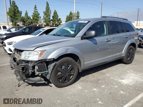 2017 Dodge Journey SE with VIN 3C4PDCAB1HT569099, listed as a Copart auction lot 85314065 with 143,721 mi miles and Salvage title. Bid and sale history available at DreamBid. Image 1.