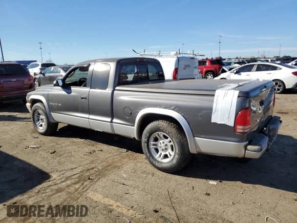 2002 Dodge Dakota SLT с VIN 1B7GL42X72S584170, выставлен на аукционе Copart как лот 77125564 с пробегом Не указан миль и Списание • Salvage title. История ставок и продаж доступна на DreamBid. Изображение 2.