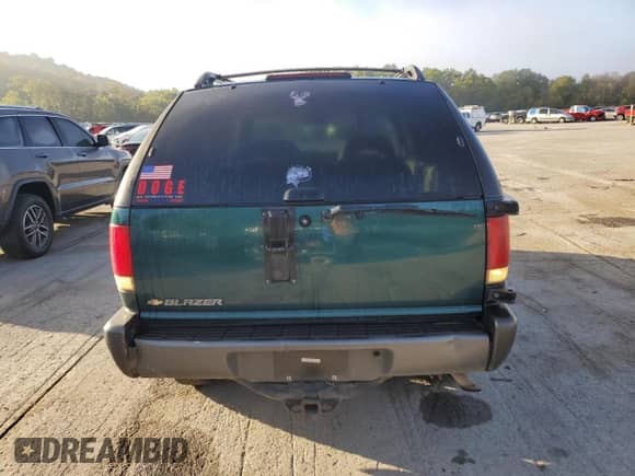 1997 Chevrolet Blazer with VIN 1GNCT18W6VK121296, listed as a Copart auction lot 86442035 with 92,389 mi miles and Clean title. Bid and sale history available at DreamBid. Image 6.