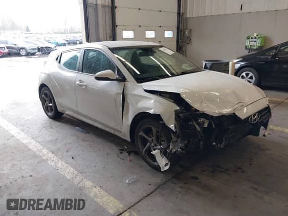 2019 Hyundai Veloster Premium with VIN KMHTG6AF7KU019571, listed as a IAAI auction lot 41478431 with 107,197 mi miles and . Bid and sale history available at DreamBid. Image 1.