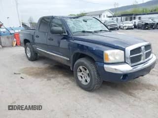 2005 Dodge Dakota Laramie с VIN 1D7HW58NX5S227633, выставлен на аукционе IAAI как лот 42122619 с пробегом 85 338 миль миль и . История ставок и продаж доступна на DreamBid. Изображение 1.