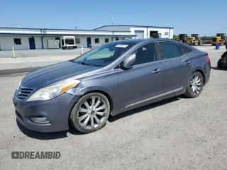 2013 Hyundai Azera с VIN KMHFH4JG2DA203487, выставлен на аукционе Copart как лот 52569915 с пробегом 190 679 миль миль и Чистый • Clean title. История ставок и продаж доступна на DreamBid. Изображение 1.