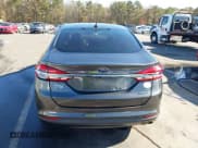 ✅ 2017 Ford Fusion Hybrid SE • VIN: 3FA6P0LU8HR260068 • Lot: 43685195. Listed on IAAI with 211,056 mi. Free auction sales archive from the USA and detailed vehicle history report at DreamBid. Image 16.