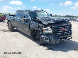 ✅ 2016 GMC Sierra 2500HD SLT • VIN: 1GT12TE89GF107831 • Lot: 43038311. Listed on IAAI with 230,691 mi. Free auction sales archive from the USA and detailed vehicle history report at DreamBid. Image 1.