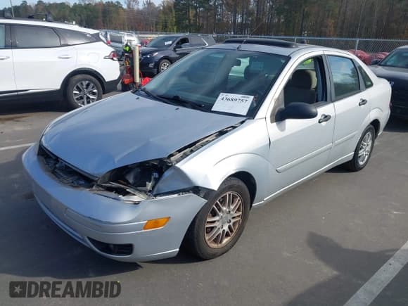 ✅ 2005 Ford Focus S • VIN: 1FAFP34NX5W112117 • Lot: 43689757. Listed on IAAI with 187,624 mi. Free auction sales archive from the USA and detailed vehicle history report at DreamBid. Image 2.