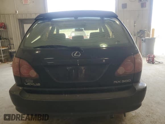 ✅ 1999 Lexus RX 300 • VIN: JT6GF10U9X0022361 • Lot: 56879415. Listed on Copart with 145,414 mi. Free auction sales archive from the USA and detailed vehicle history report at DreamBid. Image 6.