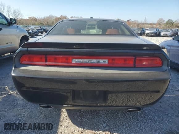 ✅ 2013 Dodge Challenger SXT • VIN: 2C3CDYAGXDH524922 • Lot: 82831684. Wystawiony na Copart z przebiegiem 218 839 mil. Bezpłatny archiwum sprzedaży aukcyjnych z USA i szczegółowy raport historii pojazdu na DreamBid. Zdjęcie 6.