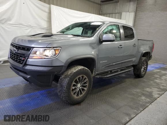 ✅ 2020 Chevrolet Colorado 4WD ZR2 • VIN: 1GCGTEEN5L1229196 • Lot: 84474734. Listed on Copart with 22,967 mi. Free auction sales archive from the USA and detailed vehicle history report at DreamBid. Image 1.