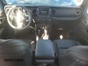 ✅ 2023 Jeep Wrangler Sahara • VIN: 1C4HJXEN4PW667027 • Лот: 84585385. Опубликован ранее на Copart с пробегом 25 751 миль. Бесплатный доступ к архиву аукционных продаж из США и подробный отчёт об истории автомобиля на DreamBid. Изображение 8.