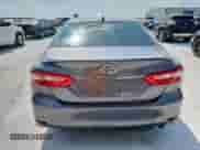 2019 Toyota Camry LE z VIN 4T1B11HK7KU815143, wystawiony jako Copart lot #69475835 z przebiegiem 122 992 mil mil oraz Szkoda całkowita • Salvage title. Historia ofert i sprzedaży dostępna na DreamBid. Obrazek 6.