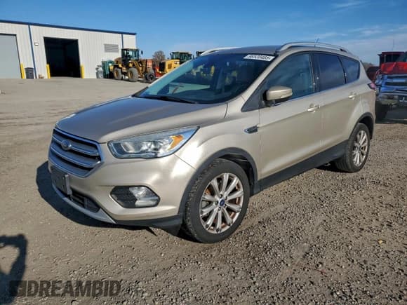 ✅ 2017 Ford Escape Titanium • VIN: 1FMCU0JD7HUB86512 • Lot: 96520485. Wystawiony na Copart z przebiegiem 202 165 mil. Bezpłatny archiwum sprzedaży aukcyjnych z USA i szczegółowy raport historii pojazdu na DreamBid. Zdjęcie 1.