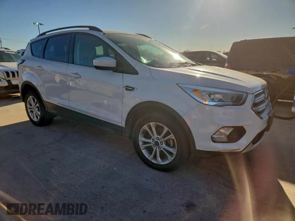 ✅ 2017 Ford Escape SE • VIN: 1FMCU0GD0HUD19554 • Lot: 96352765. Listed on Copart with 52,755 mi. Free auction sales archive from the USA and detailed vehicle history report at DreamBid. Image 4.