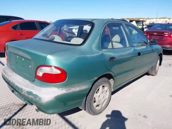 ✅ 1998 Hyundai Accent GL • VIN: KMHVF24NXWU506566 • Лот: 43575139. Опубликован ранее на IAAI с пробегом 144 846 миль. Бесплатный доступ к архиву аукционных продаж из США и подробный отчёт об истории автомобиля на DreamBid. Изображение 4.