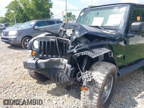 ✅ 2007 Jeep Wrangler Unlimited Sahara • VIN: 1J4GA59117L162954 • Lot: 42709530. Listed on IAAI with Not provided. Free auction sales archive from the USA and detailed vehicle history report at DreamBid. Image 6.