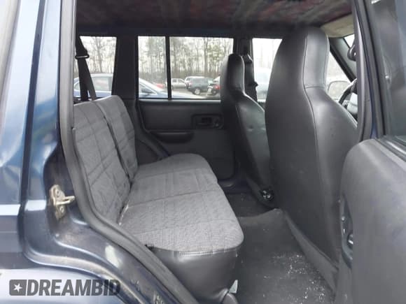 ✅ 2001 Jeep Cherokee Sport • VIN: 1J4FF48SX1L620872 • Lot: 43894063. Listed on IAAI with 164,586 mi. Free auction sales archive from the USA and detailed vehicle history report at DreamBid. Image 8.